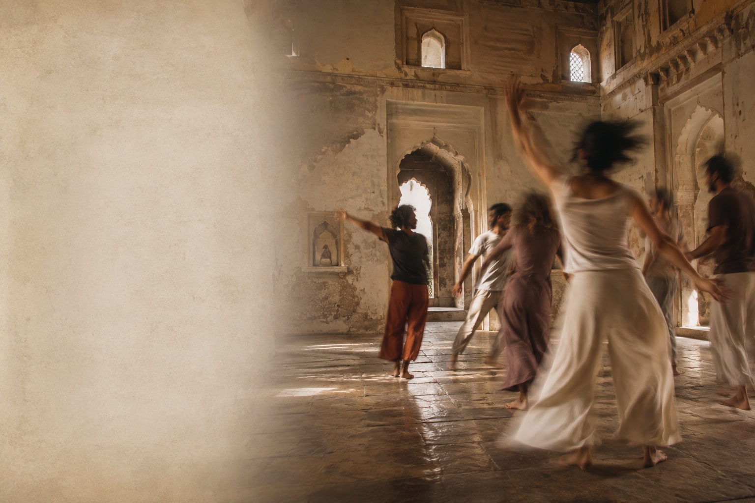 People dancing in an old building